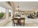 Bright dining area with a view of the living room and backyard at 9321 E Diamond Dr, Sun Lakes, AZ 85248