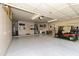 Spacious garage with storage and golf cart at 9321 E Diamond Dr, Sun Lakes, AZ 85248