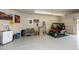 Garage with sink, storage and golf cart at 9321 E Diamond Dr, Sun Lakes, AZ 85248