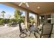 Spacious covered patio with seating area, perfect for outdoor dining at 9321 E Diamond Dr, Sun Lakes, AZ 85248