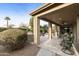 Extended covered patio with seating area and built-in BBQ at 9321 E Diamond Dr, Sun Lakes, AZ 85248