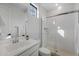 Modern bathroom with a glass shower and white sink at 9846 E Resistance Ave, Mesa, AZ 85212