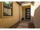 Bright and welcoming entryway with a modern door and small bench at 9846 E Resistance Ave, Mesa, AZ 85212