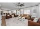 Bright and airy living room with a neutral color palette and stylish furnishings at 9846 E Resistance Ave, Mesa, AZ 85212