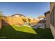 Landscaped backyard with refreshing pool at 9846 E Resistance Ave, Mesa, AZ 85212