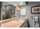 Elegant bathroom with a large mirror and updated fixtures at 9901 E Hidden Valley Rd, Scottsdale, AZ 85262