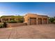 Three-car garage with ample parking space at 9901 E Hidden Valley Rd, Scottsdale, AZ 85262