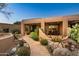 Relaxing stone pathway leads to a covered patio area at 9901 E Hidden Valley Rd, Scottsdale, AZ 85262