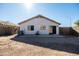 House with desert landscaping and a large backyard at 9916 E Dolphin Cir, Mesa, AZ 85208