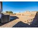 Backyard with gravel and block wall at 9916 E Dolphin Cir, Mesa, AZ 85208