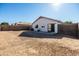 Spacious backyard with gravel and patio at 9916 E Dolphin Cir, Mesa, AZ 85208