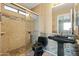 Bathroom with black pedestal sink and walk-in shower at 9916 E Dolphin Cir, Mesa, AZ 85208