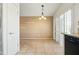 Bright dining area with tile floors and sliding glass doors at 9916 E Dolphin Cir, Mesa, AZ 85208