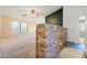 Living room with stone accent wall and neutral color palette at 9916 E Dolphin Cir, Mesa, AZ 85208