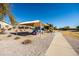 Community playground with shade structure at 9916 E Dolphin Cir, Mesa, AZ 85208