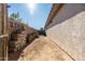 Side yard with storage and block wall at 9916 E Dolphin Cir, Mesa, AZ 85208