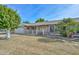 House exterior showing landscaping and driveway at 10432 W El Capitan Cir, Sun City, AZ 85351