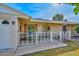 Front entry with patio and decorative fence at 10432 W El Capitan Cir, Sun City, AZ 85351