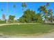 Landscaped golf course with mature trees at 10432 W El Capitan Cir, Sun City, AZ 85351