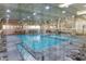 Indoor pool and fitness center with ample seating at 10432 W El Capitan Cir, Sun City, AZ 85351