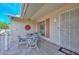 Covered patio with table and chairs, great for relaxing at 10432 W El Capitan Cir, Sun City, AZ 85351