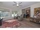 Sunroom with sliding doors leading to the dining area at 10432 W El Capitan Cir, Sun City, AZ 85351