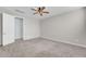 Bright and airy bedroom with carpeted floor and ample space at 11026 S 55Th Ln, Laveen, AZ 85339