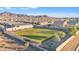 Fenced dog park with grassy area and mountain views at 11026 S 55Th Ln, Laveen, AZ 85339