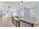 Modern kitchen with farmhouse sink and stainless steel appliances at 11026 S 55Th Ln, Laveen, AZ 85339