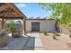 Pathway leads to a casita with a covered patio area at 12211 N 57Th St, Scottsdale, AZ 85254