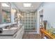 Elegant bathroom with double vanity, patterned tile shower, and dark countertops at 12211 N 57Th St, Scottsdale, AZ 85254