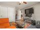 Bedroom with a stand up desk, and a view into another room at 12211 N 57Th St, Scottsdale, AZ 85254