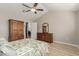 Bedroom with a queen-size bed and built in wardrobe at 1237 E Heather Ave, Gilbert, AZ 85234