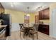 Bright kitchen with stainless steel appliances and breakfast nook at 1237 E Heather Ave, Gilbert, AZ 85234