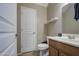 This half bathroom features a toilet and a single sink vanity at 1259 E Canyon Trl, San Tan Valley, AZ 85143