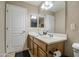 This comfortable bathroom features a double sink vanity and white cabinets at 1259 E Canyon Trl, San Tan Valley, AZ 85143