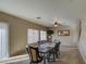 Dining room with tile flooring, neutral paint, and a table with seating for six at 1259 E Canyon Trl, San Tan Valley, AZ 85143