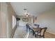 Dining area featuring a table with seating for six and tile flooring at 1259 E Canyon Trl, San Tan Valley, AZ 85143