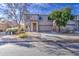 Street view of a two-story home with well-maintained landscaping and clear blue skies at 1259 E Canyon Trl, San Tan Valley, AZ 85143