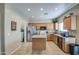 Functional kitchen with a center island, stainless steel appliances, and natural lighting at 1259 E Canyon Trl, San Tan Valley, AZ 85143