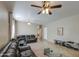 Spacious living room with tile and carpet flooring and a comfortable sectional sofa at 1259 E Canyon Trl, San Tan Valley, AZ 85143