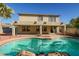 Inviting kidney-shaped pool in backyard oasis at 14210 N 135Th Dr, Surprise, AZ 85379