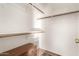 Large walk-in closet with shelving and hanging rods at 14300 W Bell Rd # 207, Surprise, AZ 85374