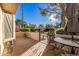 Outdoor patio furniture on a tiled patio at 14300 W Bell Rd # 207, Surprise, AZ 85374