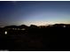 Night time aerial view of community landscape and mountain range at 14846 E Valley Vista Dr, Fountain Hills, AZ 85268