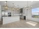 Modern kitchen with island, stainless steel appliances, and custom cabinetry at 14846 E Valley Vista Dr, Fountain Hills, AZ 85268