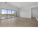 Bright living room with hardwood floors and sliding glass doors leading to a scenic view at 14846 E Valley Vista Dr, Fountain Hills, AZ 85268