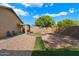 Spacious backyard with fire pit and patio at 15325 W Port Au Prince Ln, Surprise, AZ 85379