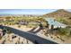 Aerial image of community clubhouse with adjacent parking lot and landscaping at 157 W Latigo Cir, San Tan Valley, AZ 85143