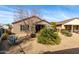 Backyard with desert landscaping and patio at 157 W Latigo Cir, San Tan Valley, AZ 85143